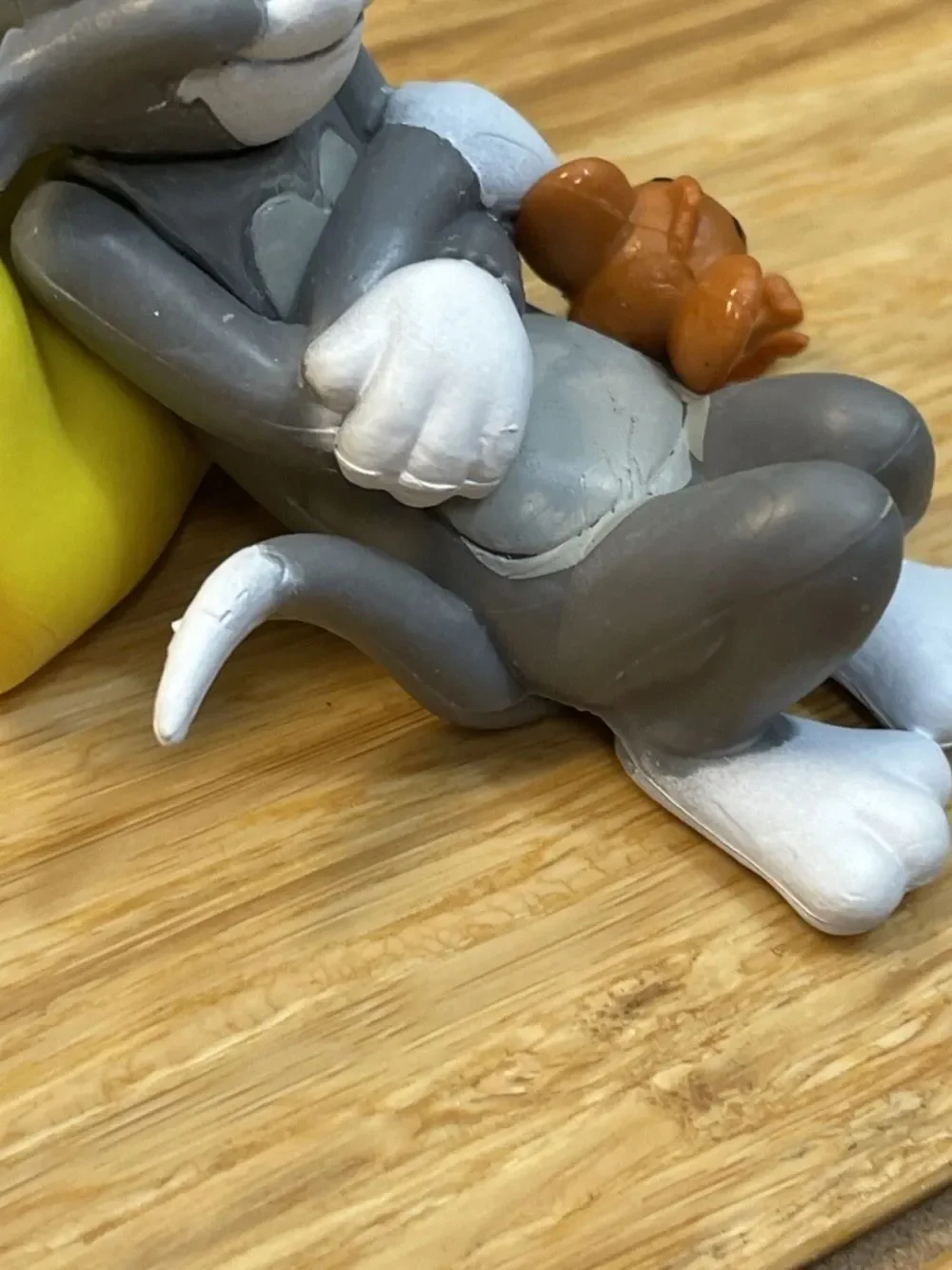 Warner Bros. Gray Tom & Brown Jerry with Yellow Cheese Bed Figurine